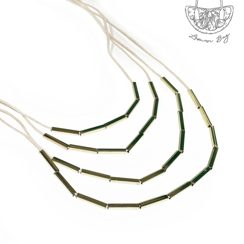 Gold Color Beads on Beige String Long Necklace